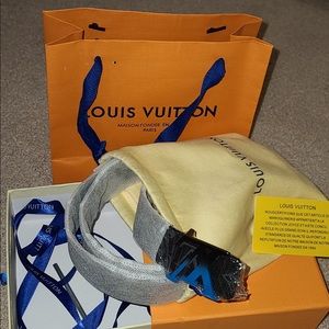 Louis Vuitton belts.